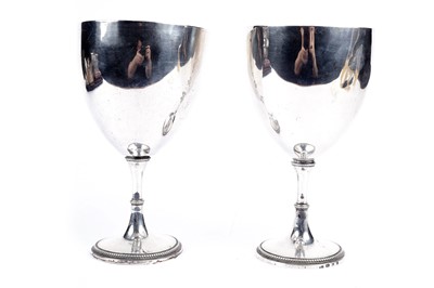 Lot 814 - A pair of George IV silver chalices