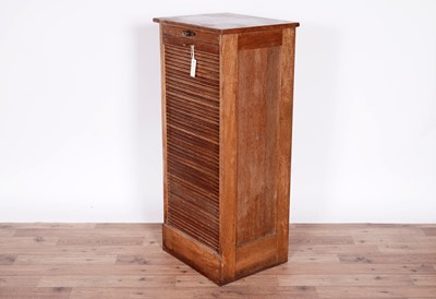 Lot 9 - An early 20th Century oak tambour front filing cabinet