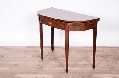 Lot 61 - A George III inlaid mahogany tea table
