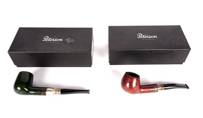 Lot 438 - Two Petersons tobacco pipes