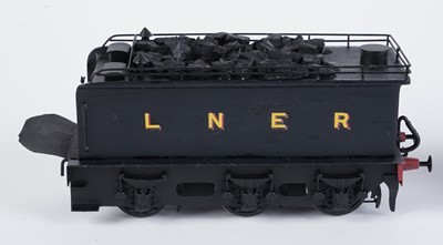 Lot 55 - A metal kit-built 0-gauge 4-4-2 locomotive and six-wheel tender