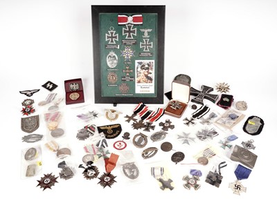 Lot 486 - A collection of German WWII style replica military items