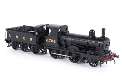 Lot 73 - A metal kit-built 0-gauge 0-6-0 locomotive and six-wheel tender