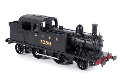 Lot 98 - A metal kit-built 0-gauge 2-4-2 locomotive