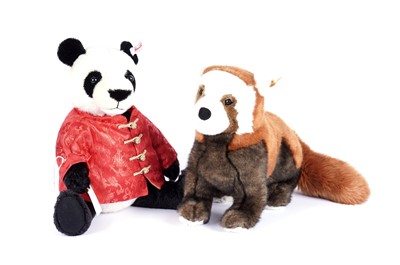 Lot 606 - Two Steiff panda teddies