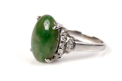 Lot 1196 - A jade and diamond ring