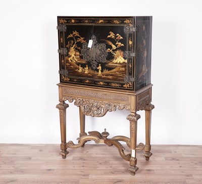 Lot 67 - An Oriental lacquered drinks cabinet