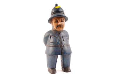 Lot 449 - A vintage carved wood policeman figure