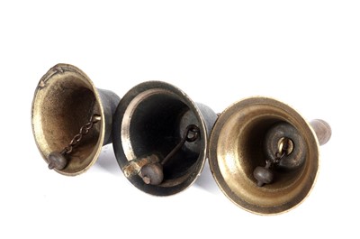 Lot 165 - Three brass hand bells