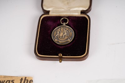 Lot 858 - The FA Cup 1924 winner's medal awarded to William Bradley; a pocket watch; a chain; and other items