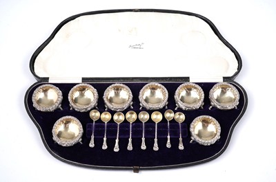 Lot 1497 - A Victorian cased set of eight small salts with matching spoons