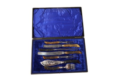 Lot 1371 - An Edwardian cased carving set