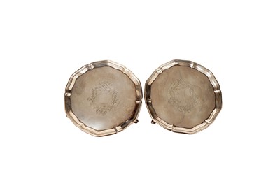 Lot 1518 - A pair of George III waiters