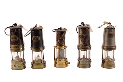 Lot 432 - A collection of Patterson & Co miners lamps