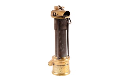 Lot 434 - A 19th Century brass davy miners lamp