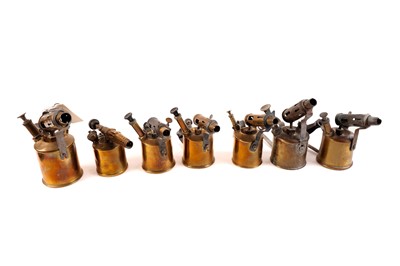 Lot 359 - A collection of brass blow torches by various makers