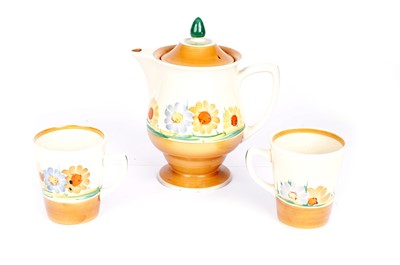 Lot 905 - Susie Cooper coffee jug and two mugs