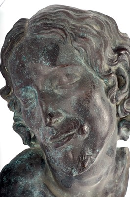 Lot 233 - A patinated copper bust of a man