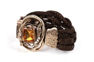 Lot 1142 - A Victorian hairwork cuff bracelet