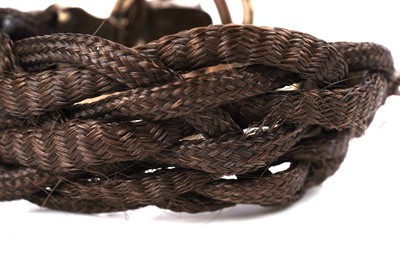 Lot 1142 - A Victorian hairwork cuff bracelet