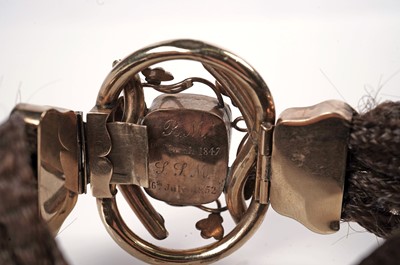 Lot 1142 - A Victorian hairwork cuff bracelet