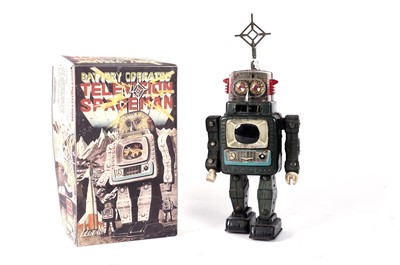 Lot 588 - A tinplate battery powered television spaceman robot