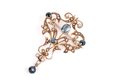 Lot 617 - An Edwardian aquamarine and seed pearl pendant brooch