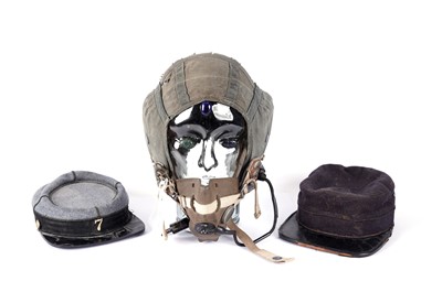 Lot 497 - A British RAF helmet and two kepis