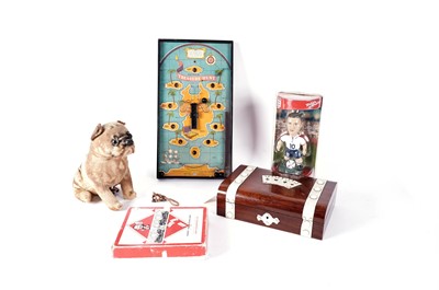 Lot 49 - A collection of vintage toys and games, including a Monopoly set