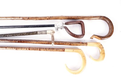 Lot 510A - Collection of walking sticks and sporting equipment