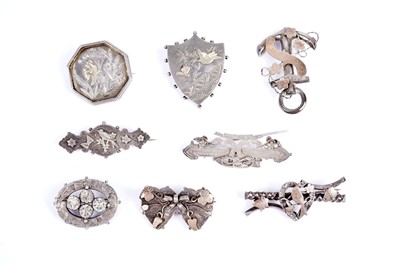 Lot 621 - Late Victorian sentimental silver and white metal brooches