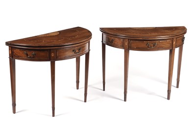 Lot 747 - A pair of 19th Century Sheraton style mahogany demi-lune fold-over tables