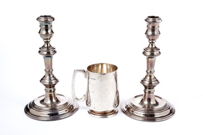 Lot 1341 - A pair of Elizabeth II candlesticks and a Christening mug