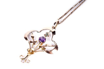 Lot 631 - An Edwardian amethyst openwork pendant necklace