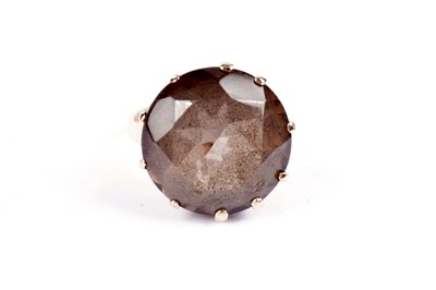 Lot 598 - Three rings including a smoky quartz dress ring