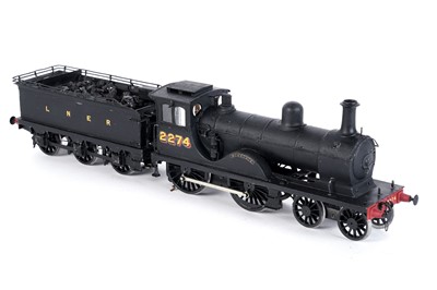 Lot 168 - A metal kit-built 0-gauge 4-4-0 locomotive and six-wheel tender