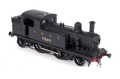 Lot 205 - A metal kit-built 0-gauge 2-4-2 locomotive