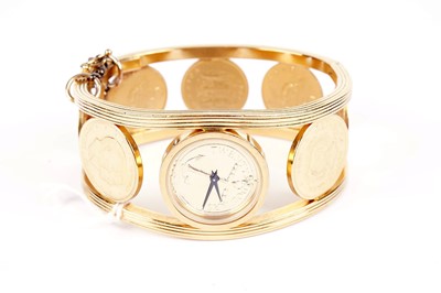 Lot 736 - A 1980s Franklin Mint Golden Caribbean bangle watch