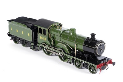 Lot 238 - A metal kit-built 0-gauge 4-4-0 locomotive and six-wheel tender