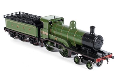 Lot 242 - A metal kit-built 0-gauge 4-4-0 locomotive and six-wheel tender