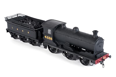 Lot 252 - A metal kit-built 0-gauge 0-6-0 locomotive and six-wheel tender