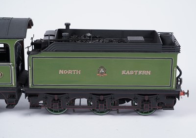 Lot 273 - A metal kit-built 0-gauge 4-4-0 locomotive and six-wheel tender