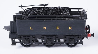Lot 283 - A metal kit-built 0-gauge 0-60 locomotive and six-wheel tender
