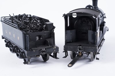 Lot 283 - A metal kit-built 0-gauge 0-60 locomotive and six-wheel tender