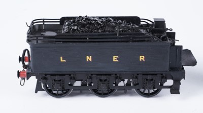 Lot 283 - A metal kit-built 0-gauge 0-60 locomotive and six-wheel tender