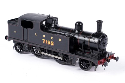 Lot 285 - A metal kit-built 0-gauge 2-4-2 locomotive