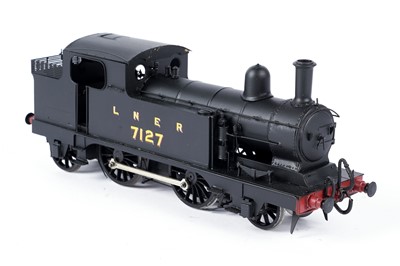 Lot 286 - A metal kit-built 0-gauge 2-4-2 locomotive