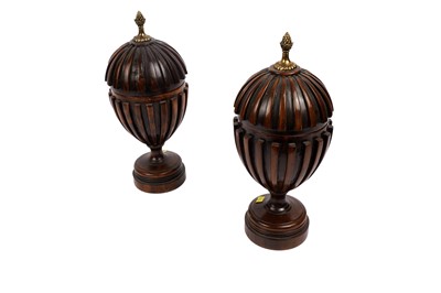 Lot 695 - A pair of Regency-style mahogany urns