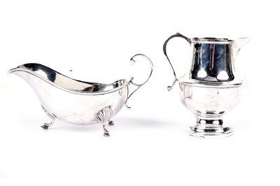 Lot 772 - An Edwardian silver sauce boat; and a cream jug