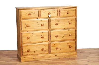 Lot 57 - A vintage pine chest of drawers